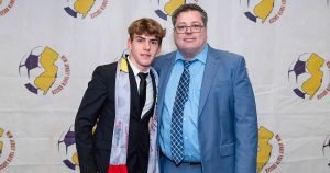 New Jersey ODP player Sandro Cunningham takes a photo with James Galanis, NJYS Director of Technical Operations.