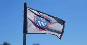 A flag for US Youth Soccer's Olympic Development Program waves in the wind.