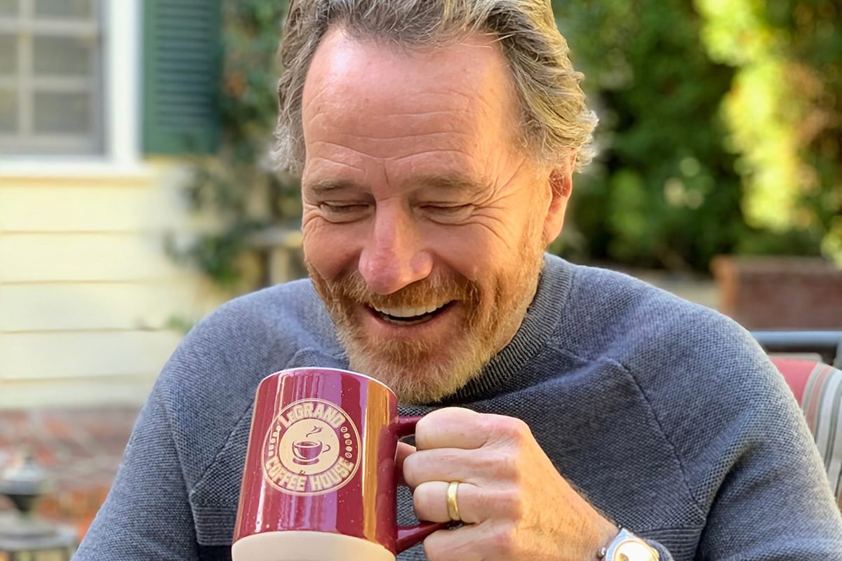 Bryan Cranston drinks from a LeGrand Coffee House mug.