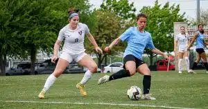 Defender Madelyn Walsh approaches an opposing player.