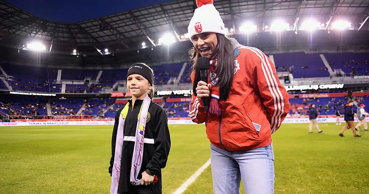 A youth player is honored on the field at Red Bull Arena for scoring the New Jersey Youth Soccer Goal of the Year.