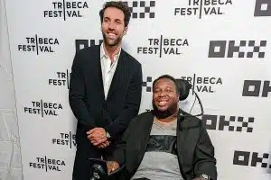 Paul Rabil and Eric LeGrand pose for a photo at the Tribeca Film Festival.