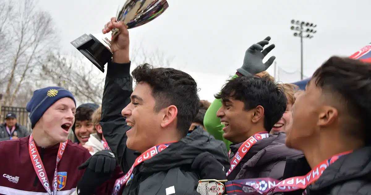 A Tennessee youth soccer team celebrates its State Cup Championship.