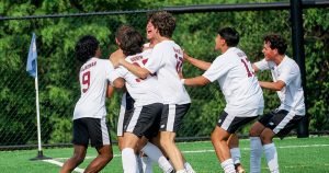 15U players from Naugatuck Youth Soccer celebrate a penalty shootout win at the Eastern Presidents Cup.